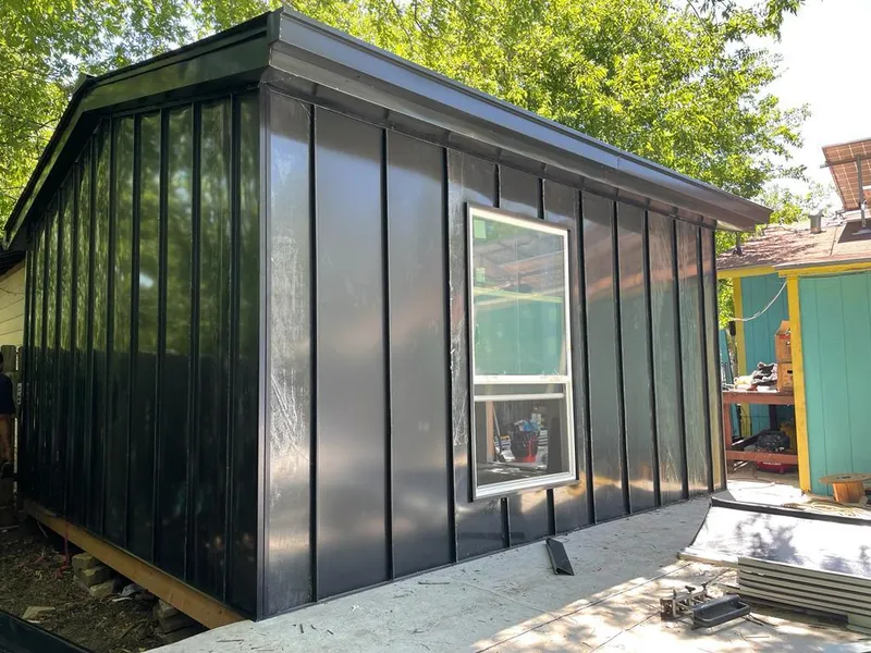 Black standing seam metal wall panels for Roof Inspection in Cameron Park