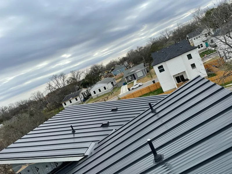 Standing seam metal roof panels with vents for Skylight Repair in Cameron Park